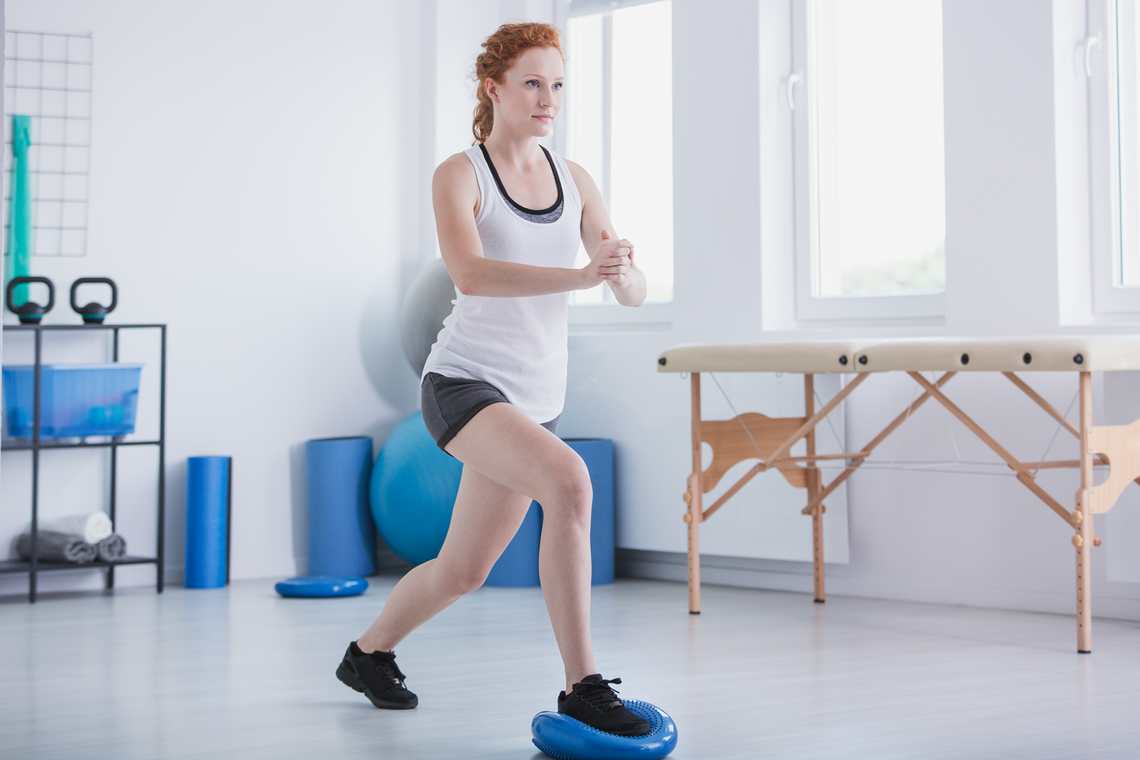 sportswoman-exercising-in-gymnastic-room-with-equi-X8UBMH6 Physio in Cranbourne